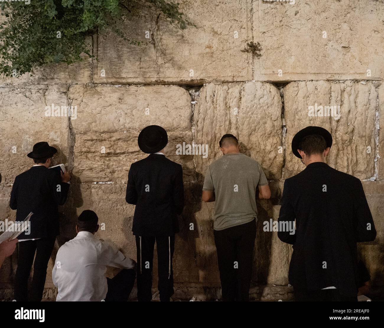 Jerusalem, Israel. 26th July, 2023. Ultra-Orthodox men praying during Tisha B'Av memorial day in the Western Wall in Jerusalem. © Valentin Sama-Rojo/Alamy Live News. Stock Photo