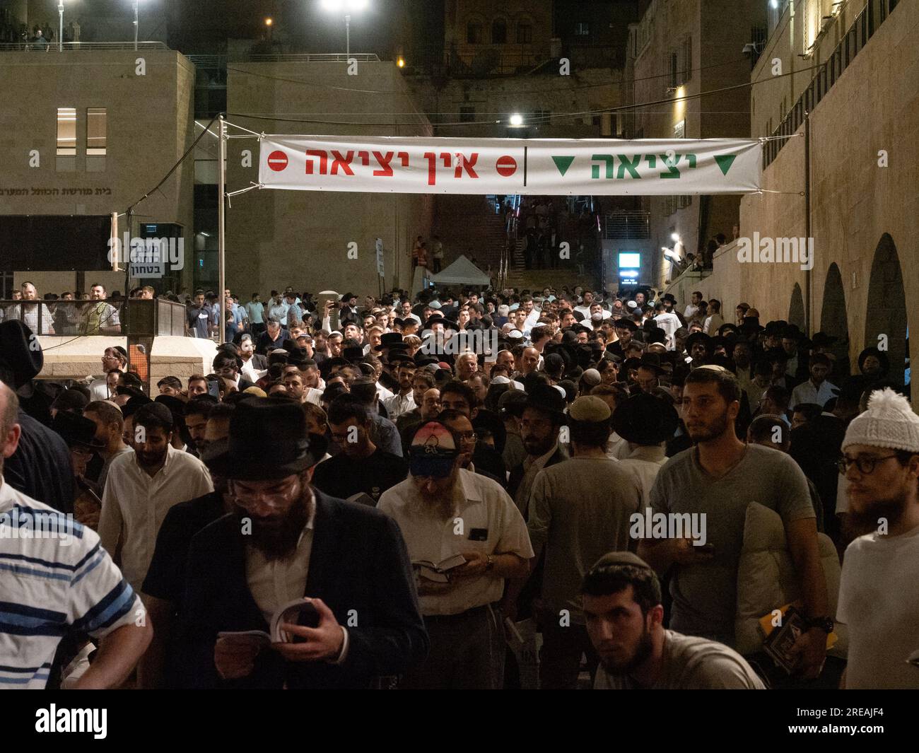 Jerusalem, Israel. 26th July, 2023. Ultra-Orthodox and religious men entering and exiting the Western Wall during Tisha B'Av memorial day. © Valentin Sama-Rojo/Alamy Live News. Stock Photo