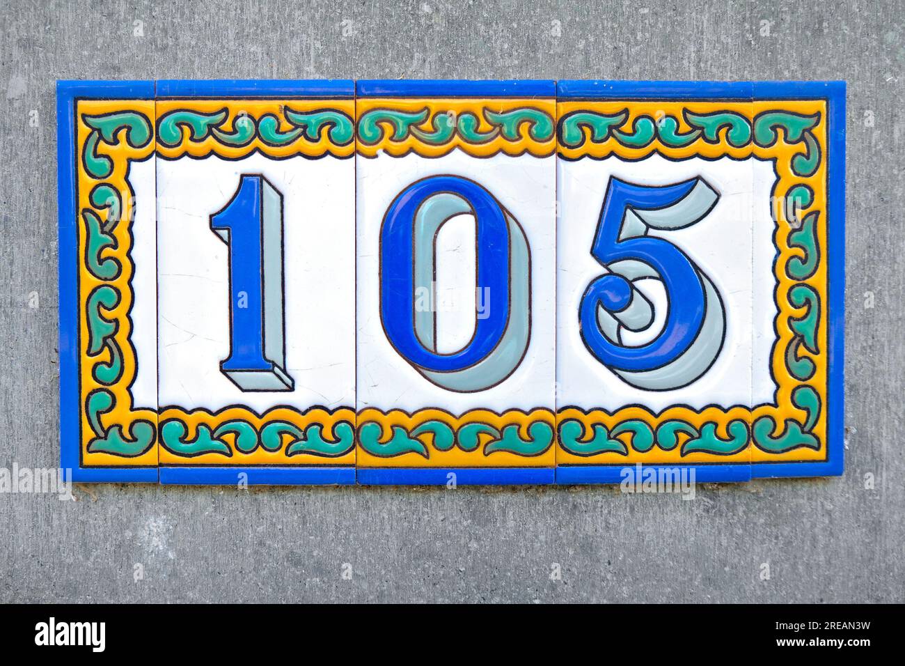 Number 105, one hundred and five, in blue digits on gary background ...