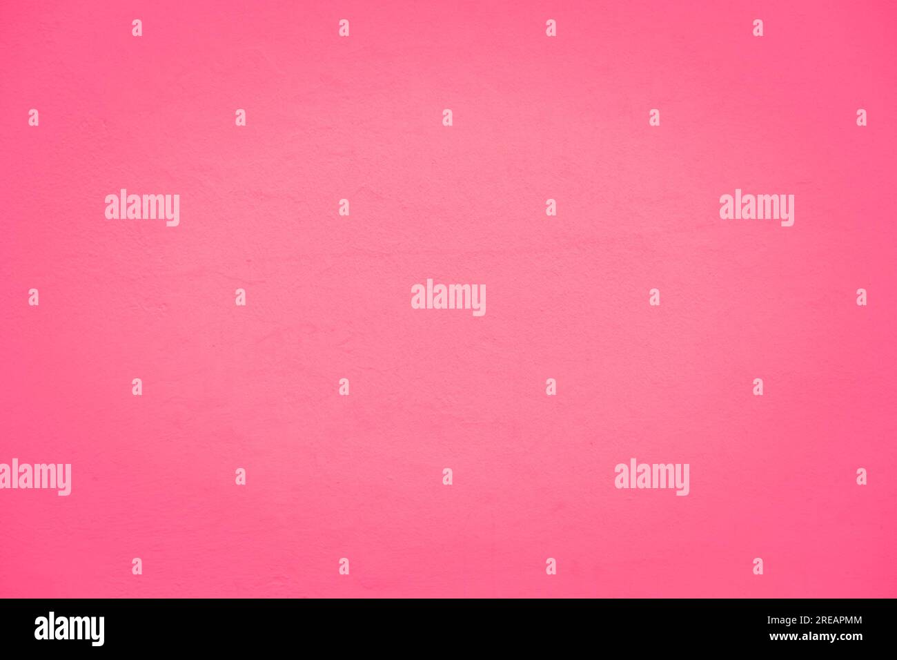 Perfect pink barbie movie color painted wall with large empty space for text. Stock Photo
