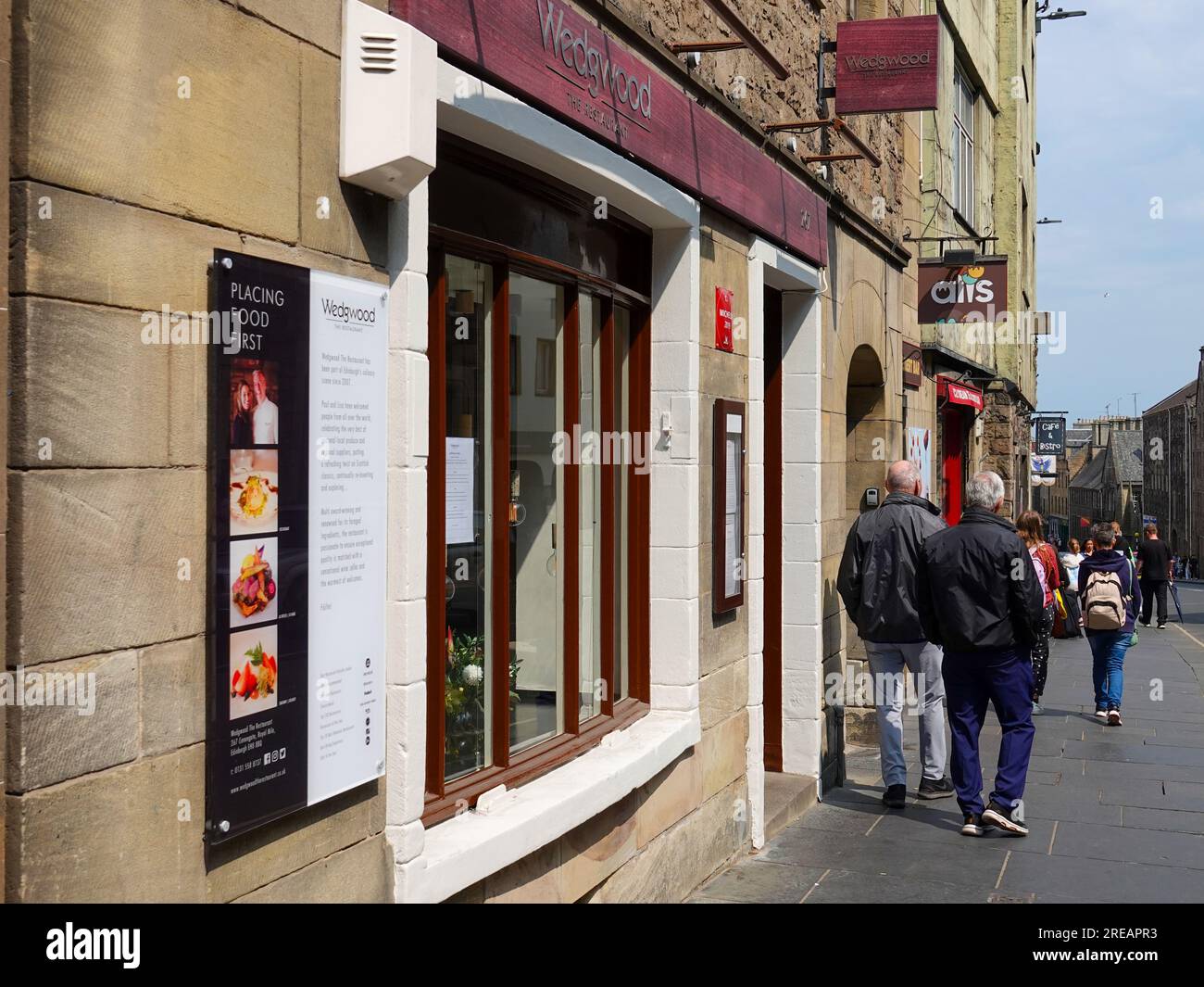 People walking past Wedgwood the Restaurant, Canongate, Royal Mile