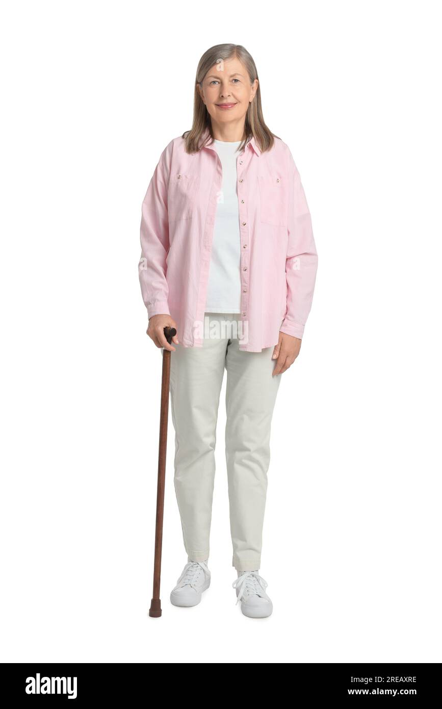Senior woman with walking cane on white background Stock Photo - Alamy