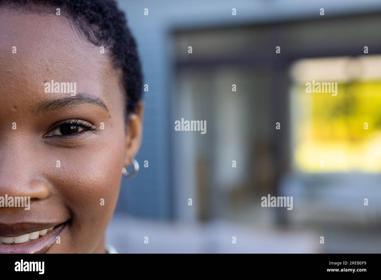 Portrait of happy african american woman with short black hair, smiling ...
