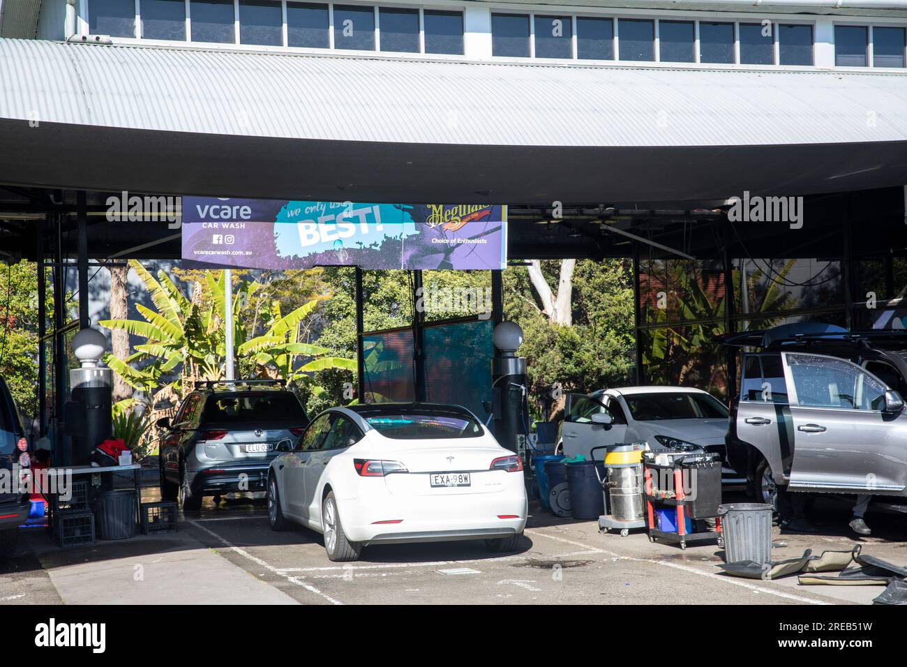 hand-car-wash-business-in-sydney-australia-a-tesla-model-3-waits-to-be