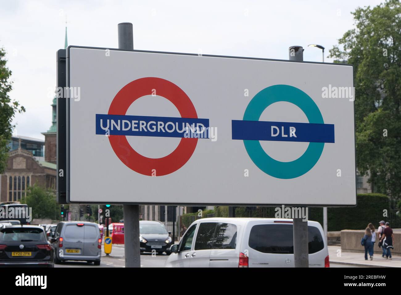 London, UK. A TfL Underground and DLR sign with the distinctive roundal logos at Tower Hill. Stock Photo