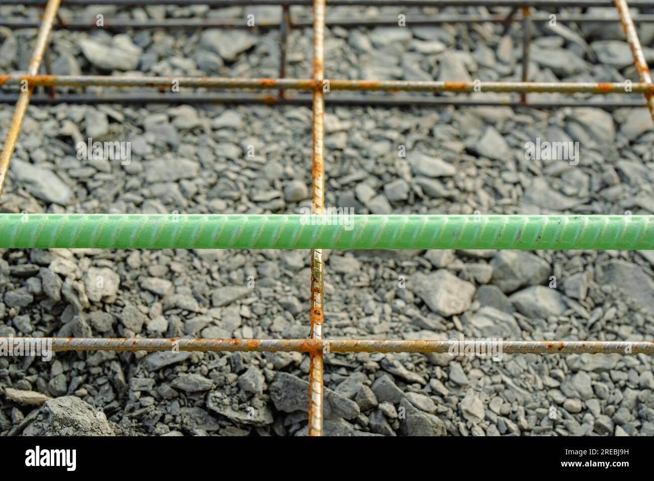 Welded wire mesh, WWM, installed within a sidewalk concrete form prior