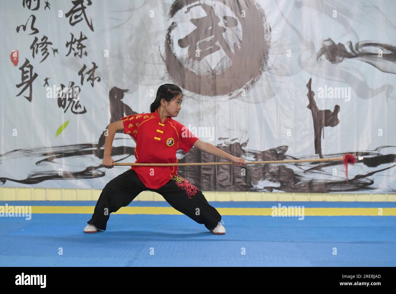 Students practice Chinese martial arts during the summer vacation in