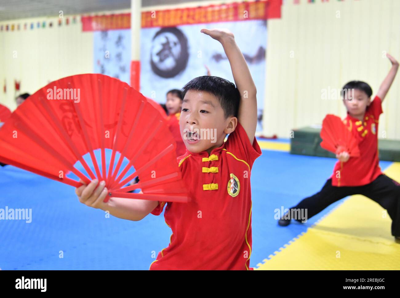 Students practice Chinese martial arts during the summer vacation in