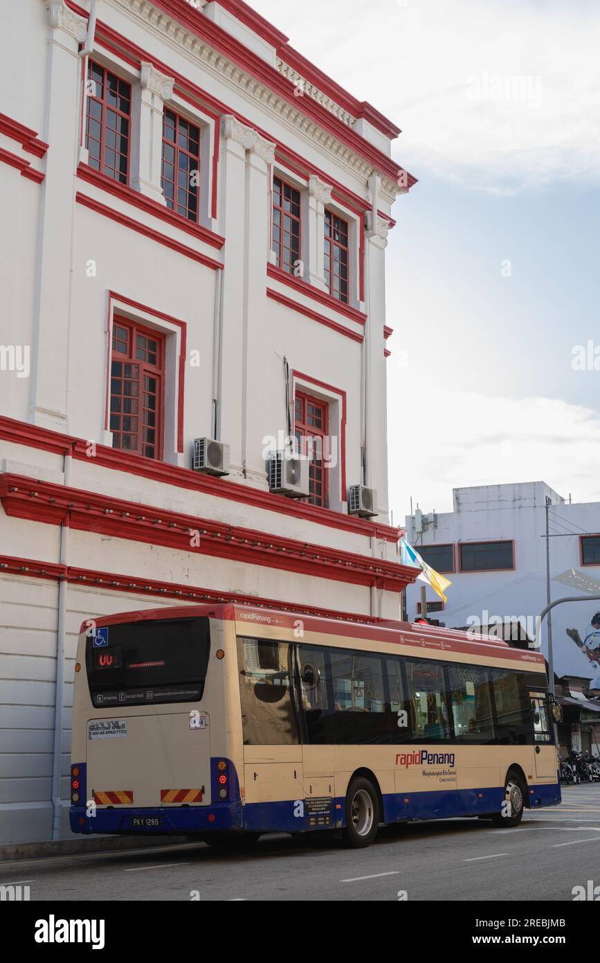 Penang, Malaysia - July 5, 2023 : Georgetown old building and rapid bus Stock Photo
