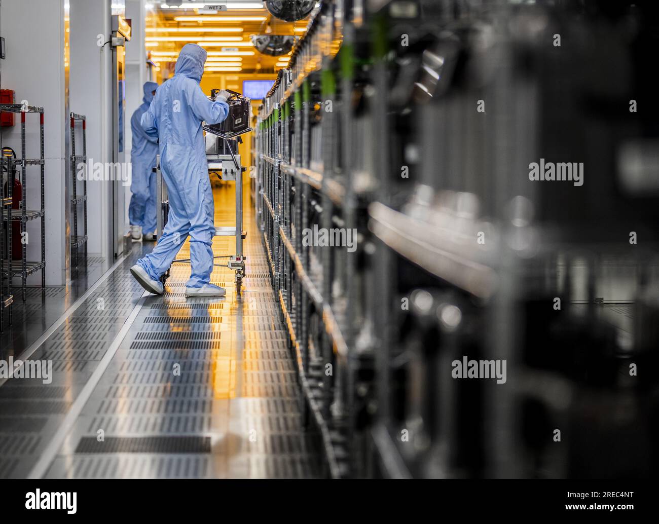 NIJMEGEN - An employee at work in the factory of chip manufacturer 