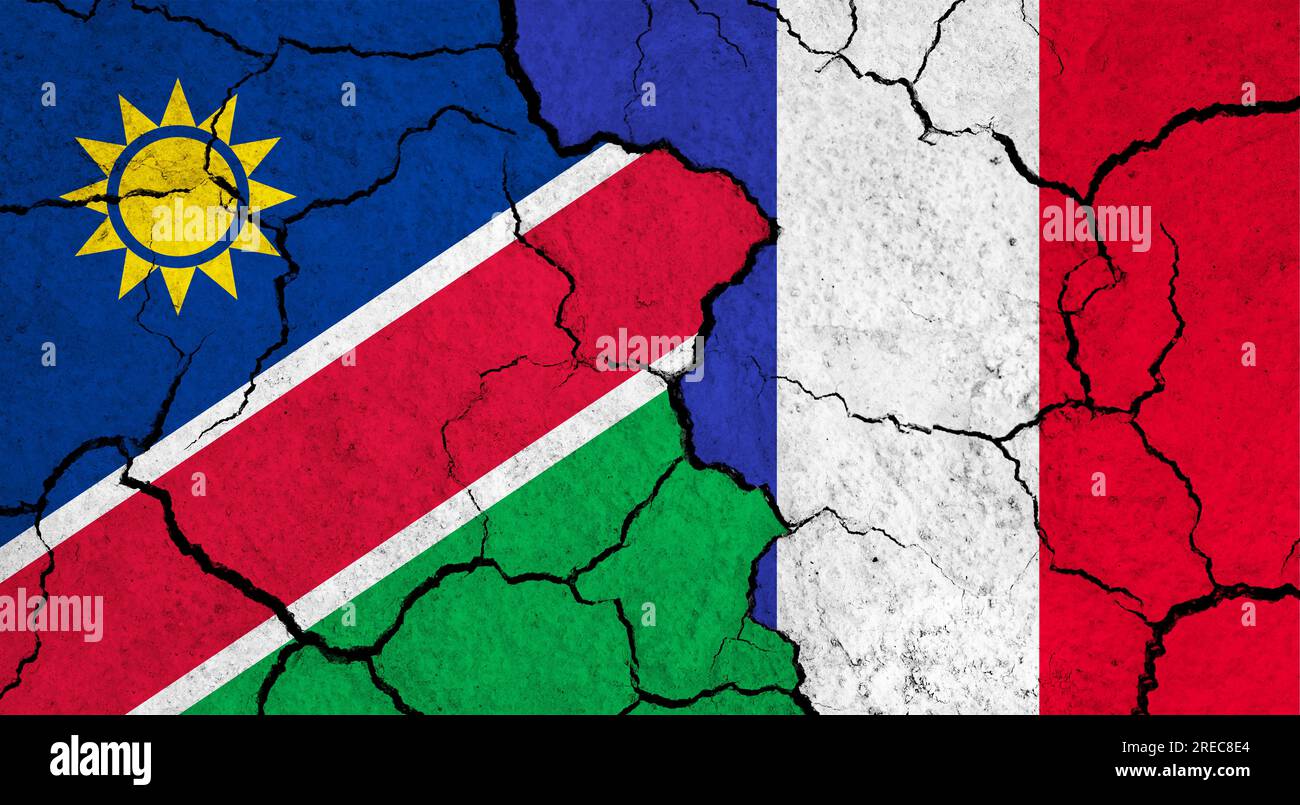 Flags of Namibia and France on cracked surface - politics, relationship concept Stock Photo