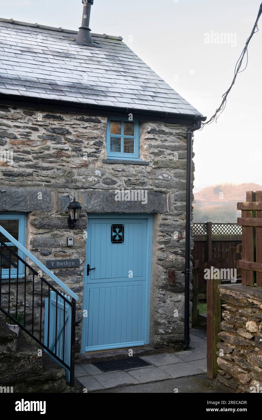 Stone holiday cottage for rent to tourists, Old coach house in Capel Garmon, within Snowdonia National Park Stock Photo