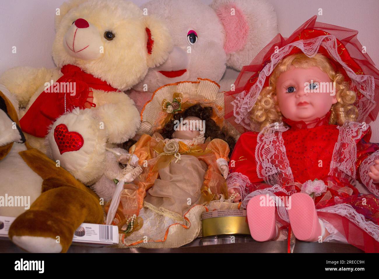 many dolls and soft bear on the pile Stock Photo