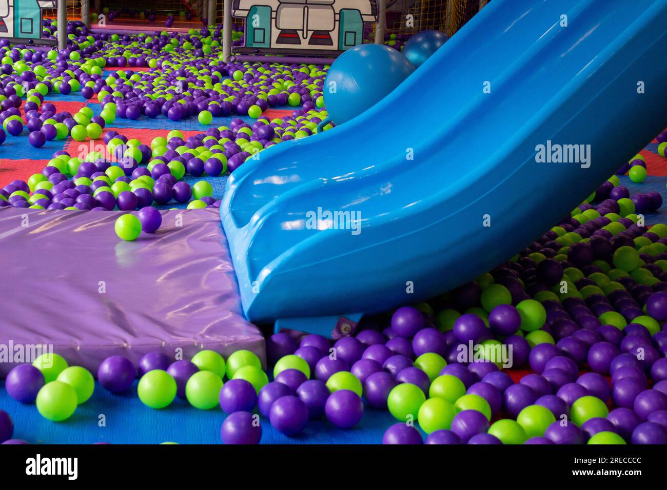 playground with slide and Colored plastic balls Stock Photo Alamy