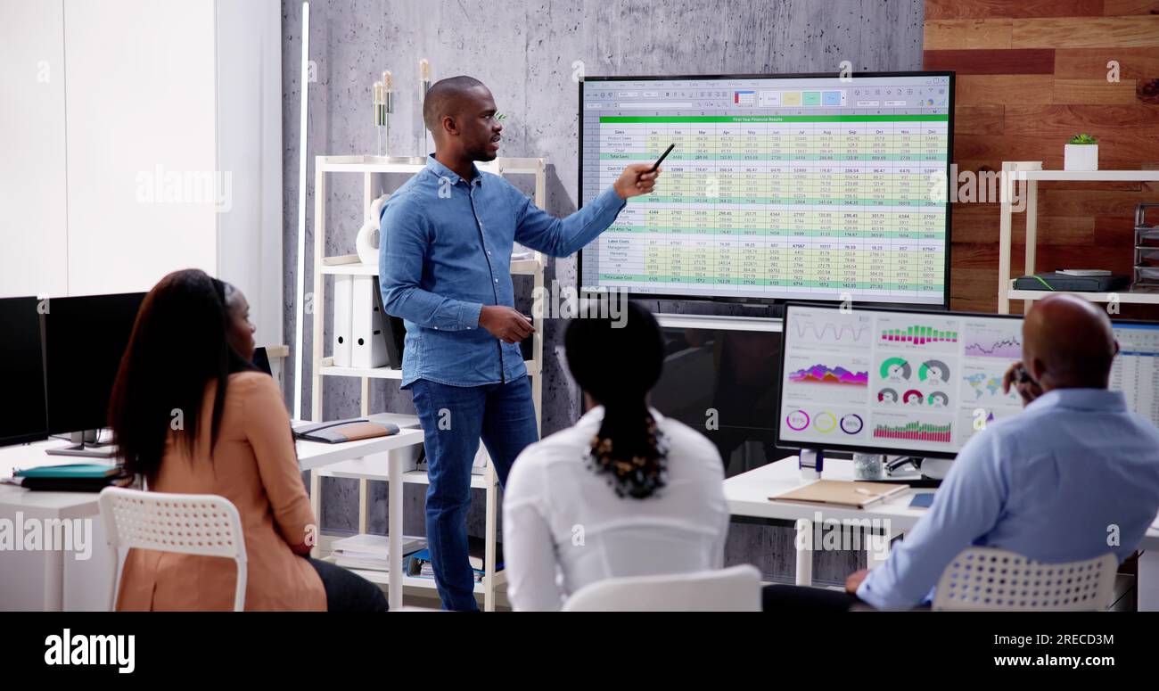 Corporate Training Presentation In Classroom With Computers Stock Photo ...