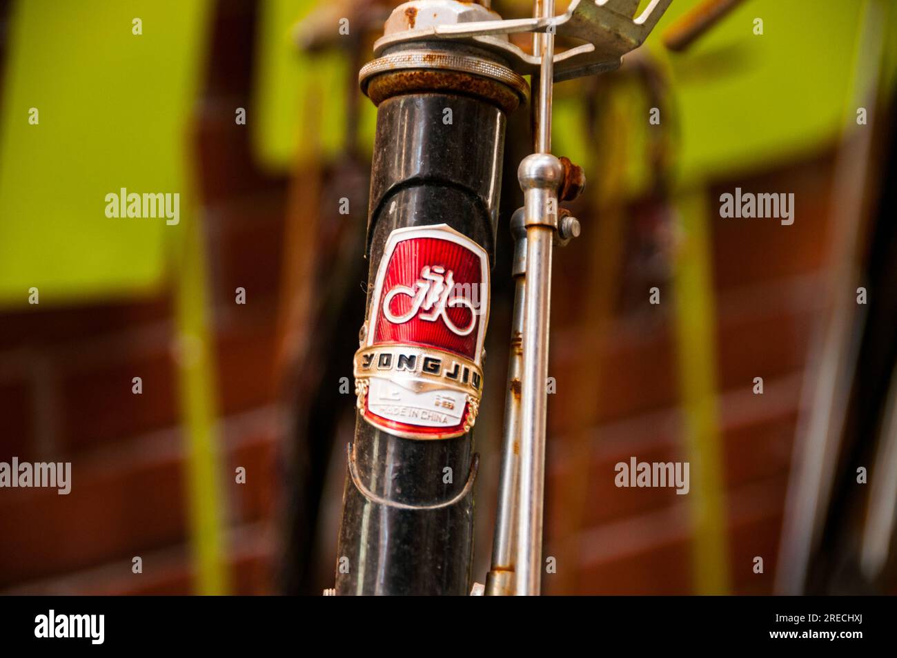 Two Yongjiu (Forever) classic bicycles at a bicycle rack outside the ...