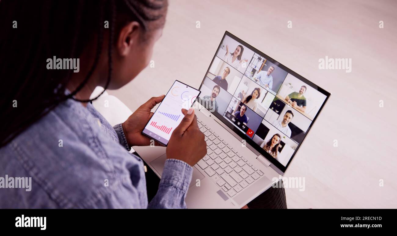 Watching Video Conference Business Webinar On Computer Stock Photo