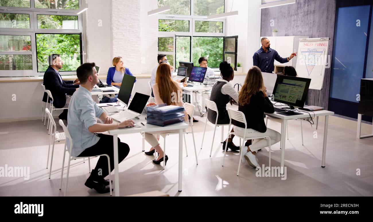 Corporate Training Presentation In Classroom With Computers Stock Photo ...