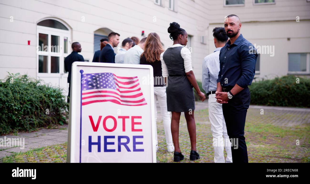 Diverse People At Voting Booth. Vote Here Elections Sign Stock Photo ...
