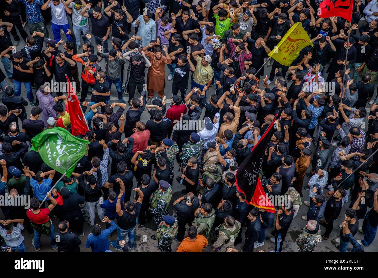Kashmiri Shiite Muslim mourners take part in the 8th day of Muharram ...