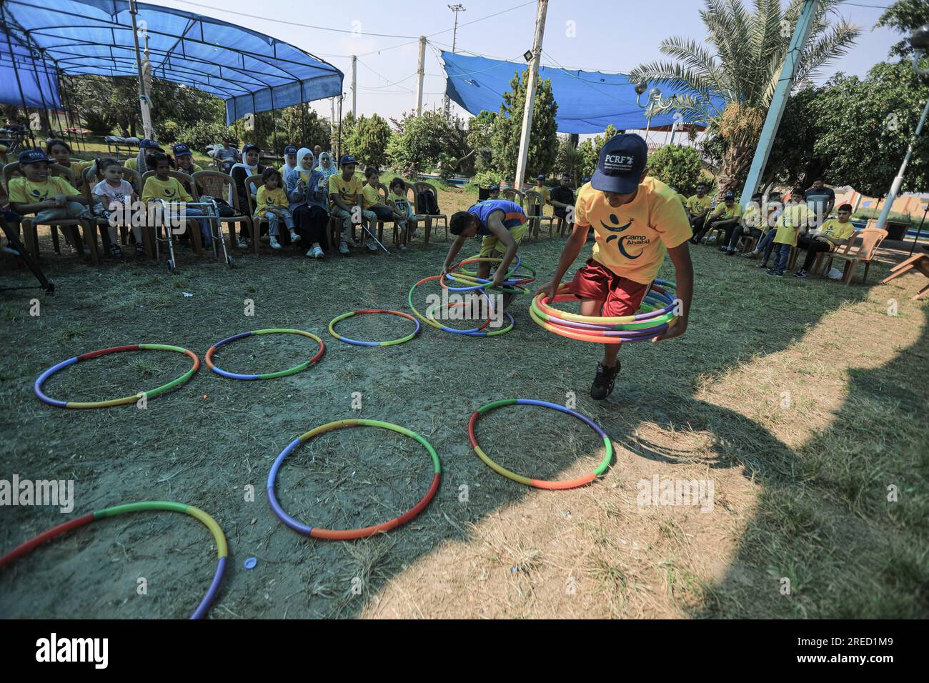 Gaza, Palestine. 25th July, 2023. Palestinian amputees play 'jumping' during a summer camp for psychological support for amputees sponsored by the Palestinian Children's Relief Society (PCRF) in Khan Yunis, southern Gaza Strip. Credit: SOPA Images Limited/Alamy Live News Stock Photo