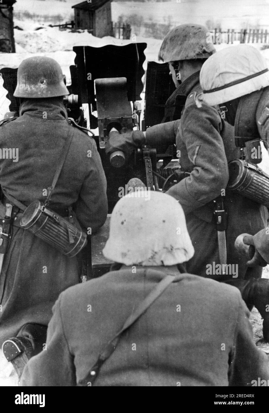 German soldiers firing an infantry gun on the Eastern Front. Photo ...