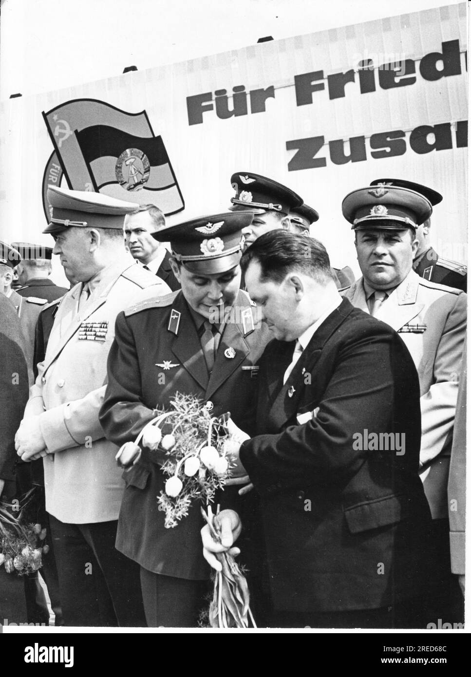 'In a large-scale friendship event in Marzahn, the Chairman of the LPG ''Lenin'', Erich Drengner (1st from right) was awarded the Order ''Red Star'' by decision of the Supreme Soviet of the USSR. He had saved a Soviet pilot captain from death at the risk of his life. Photo: MAZ/Wolfgang Mallwitz, 07.05.1966 [automated translation]' Stock Photo