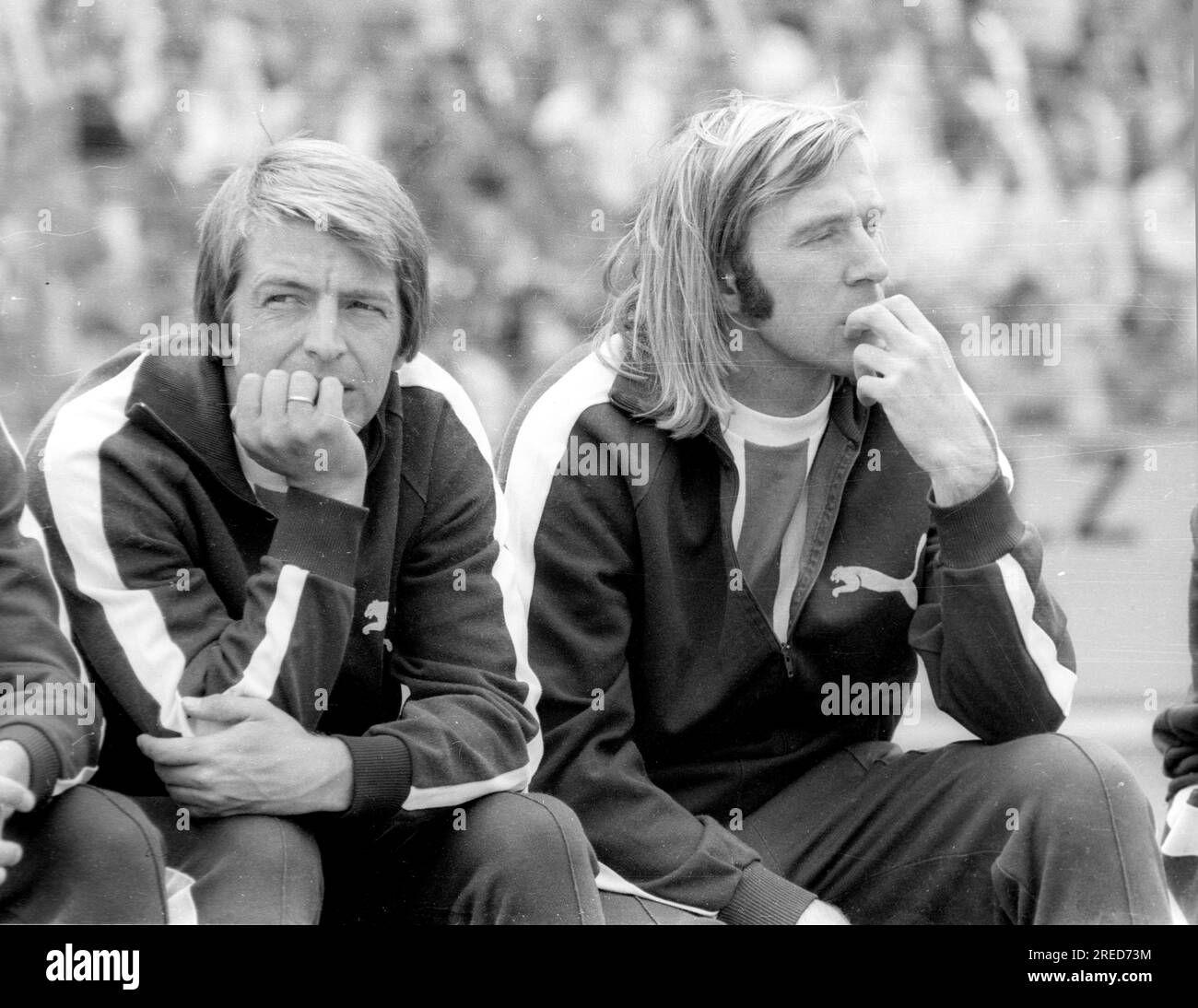 DFB Cup Final 1973: Borussia Mönchengladbach - 1. FC Köln 2:1 / Hartwig Bleidick and Günter Netzer (both Borussia) pensive on the bench [automated translation] Stock Photo