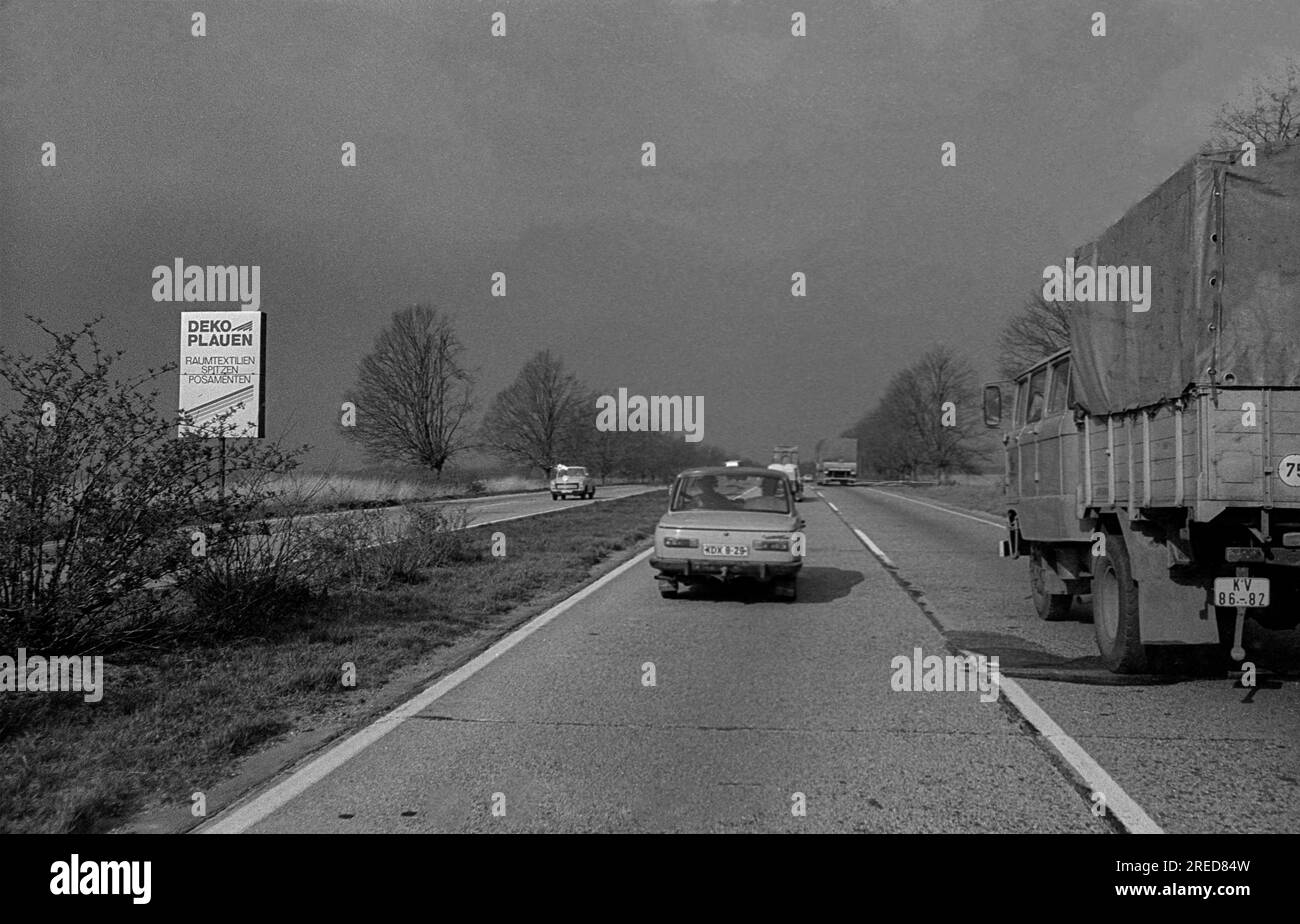 GDR, Plauen, 25.03.1990, highway near Plauen, Thuringia, Wartburg (car), W50 Laster (truck), DEKO Plauen, [automated translation] Stock Photo
