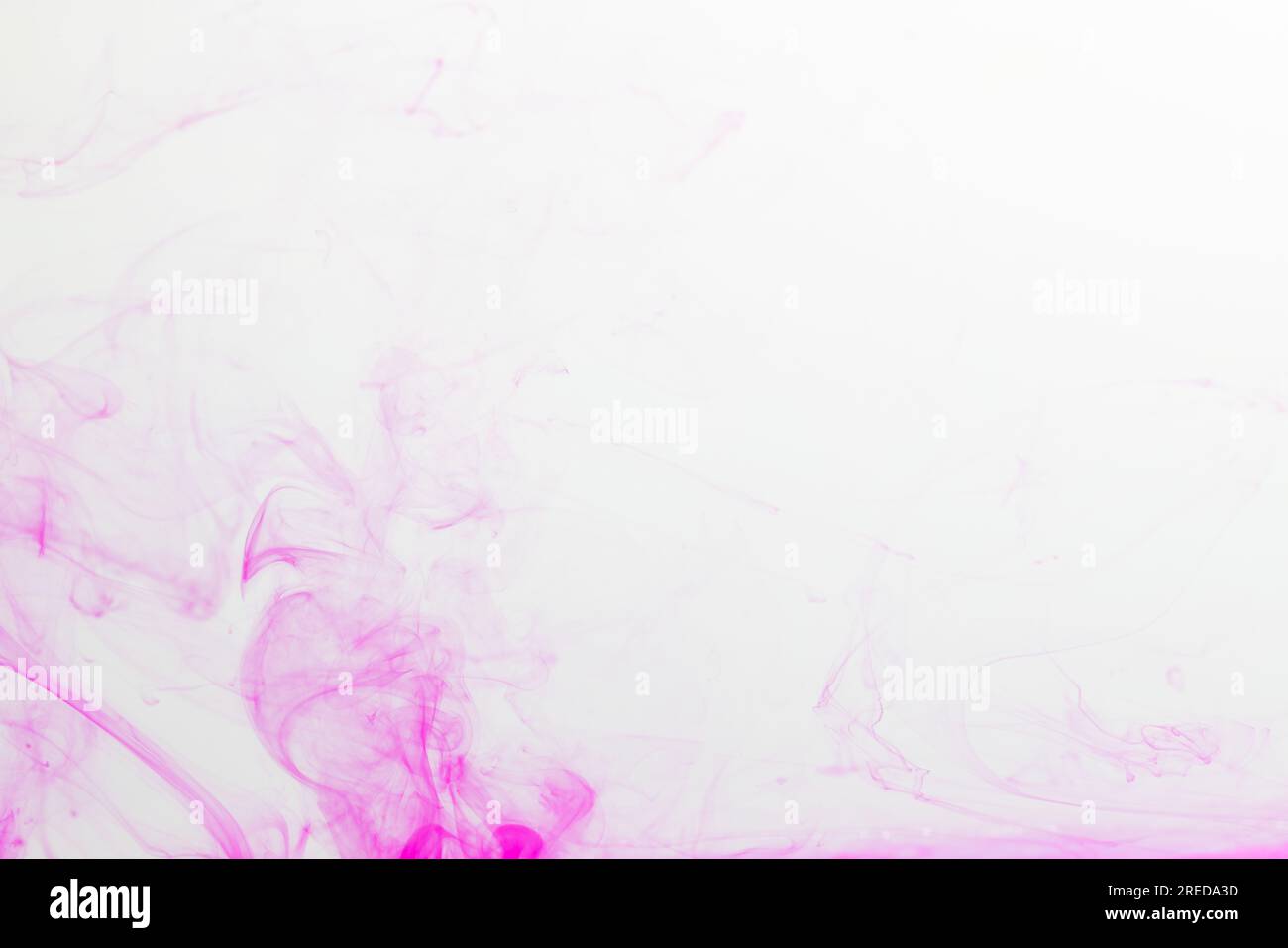Ink in water pink hi-res stock photography and images - Alamy