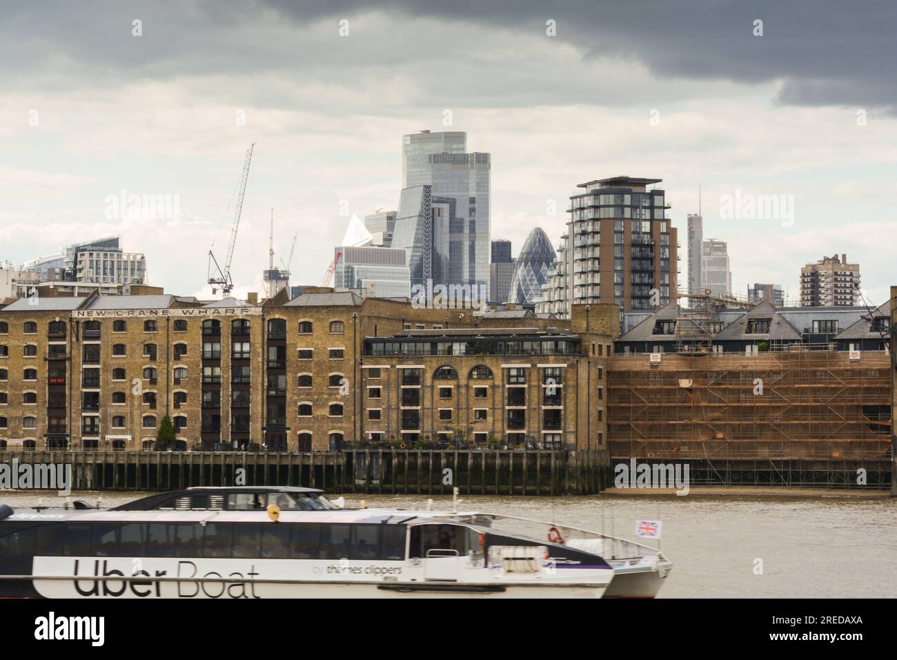 An Uber Boat travelling downstream on the River Thames at Wapping, London, E1, England, U.K. Stock Photo