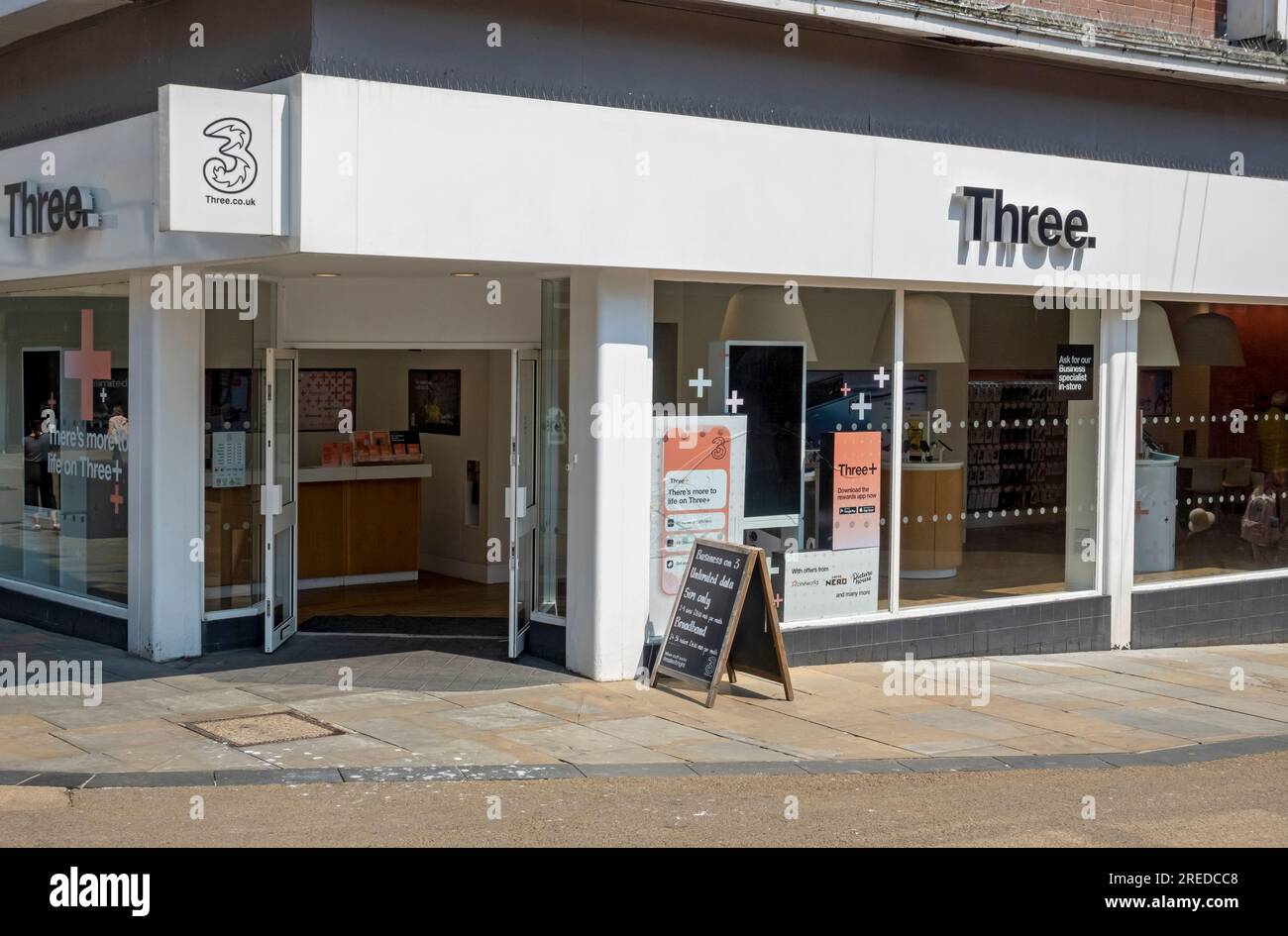 3 Three mobile phone shop sign signs store exterior on the high street Scarborough North Yorkshire England UK United Kingdom GB Great Britain Stock Photo