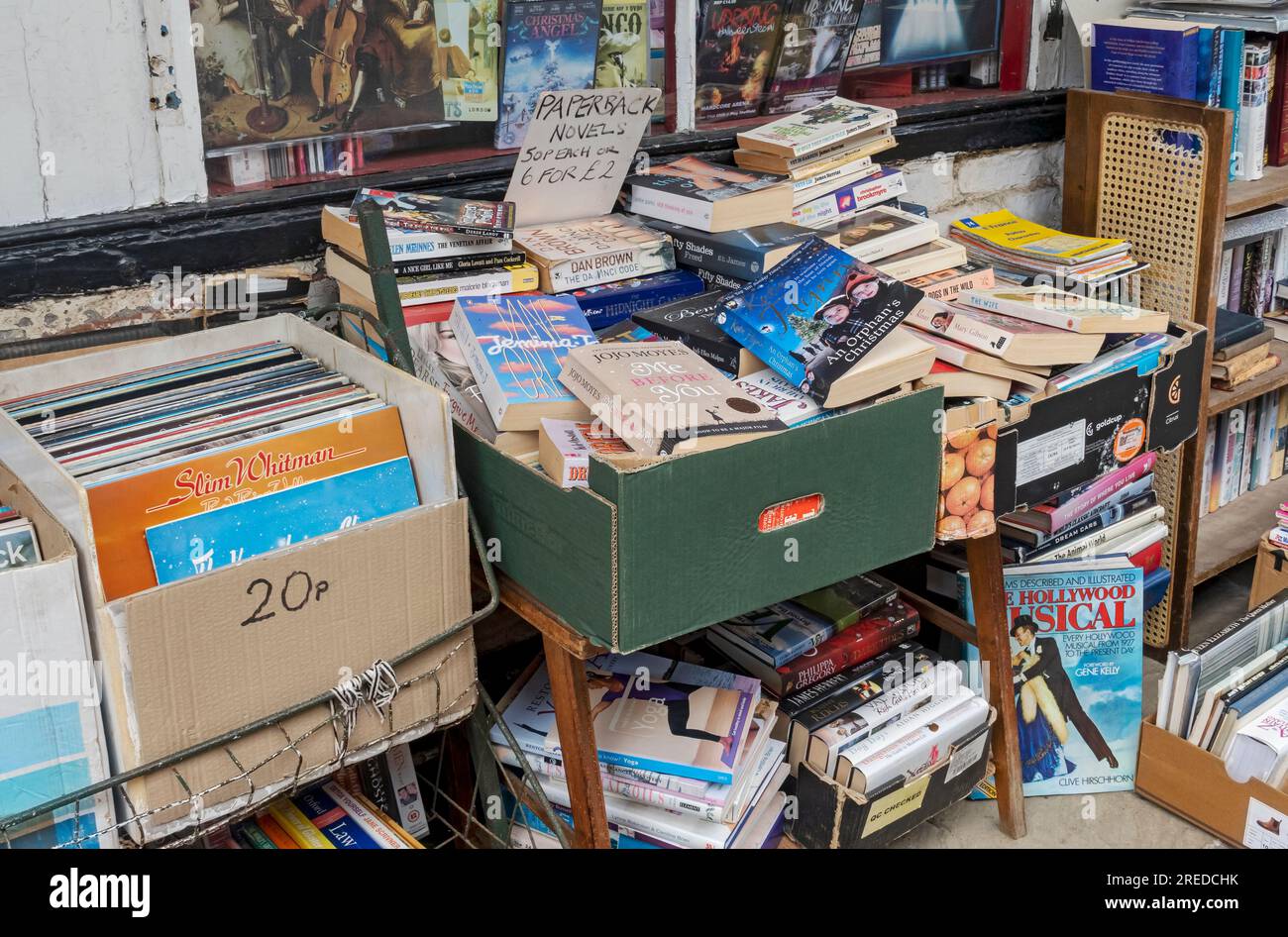 Secondhand books and vinyl records for sale outside shop store local independent business Market Street Malton North Yorkshire England UK Britain Stock Photo