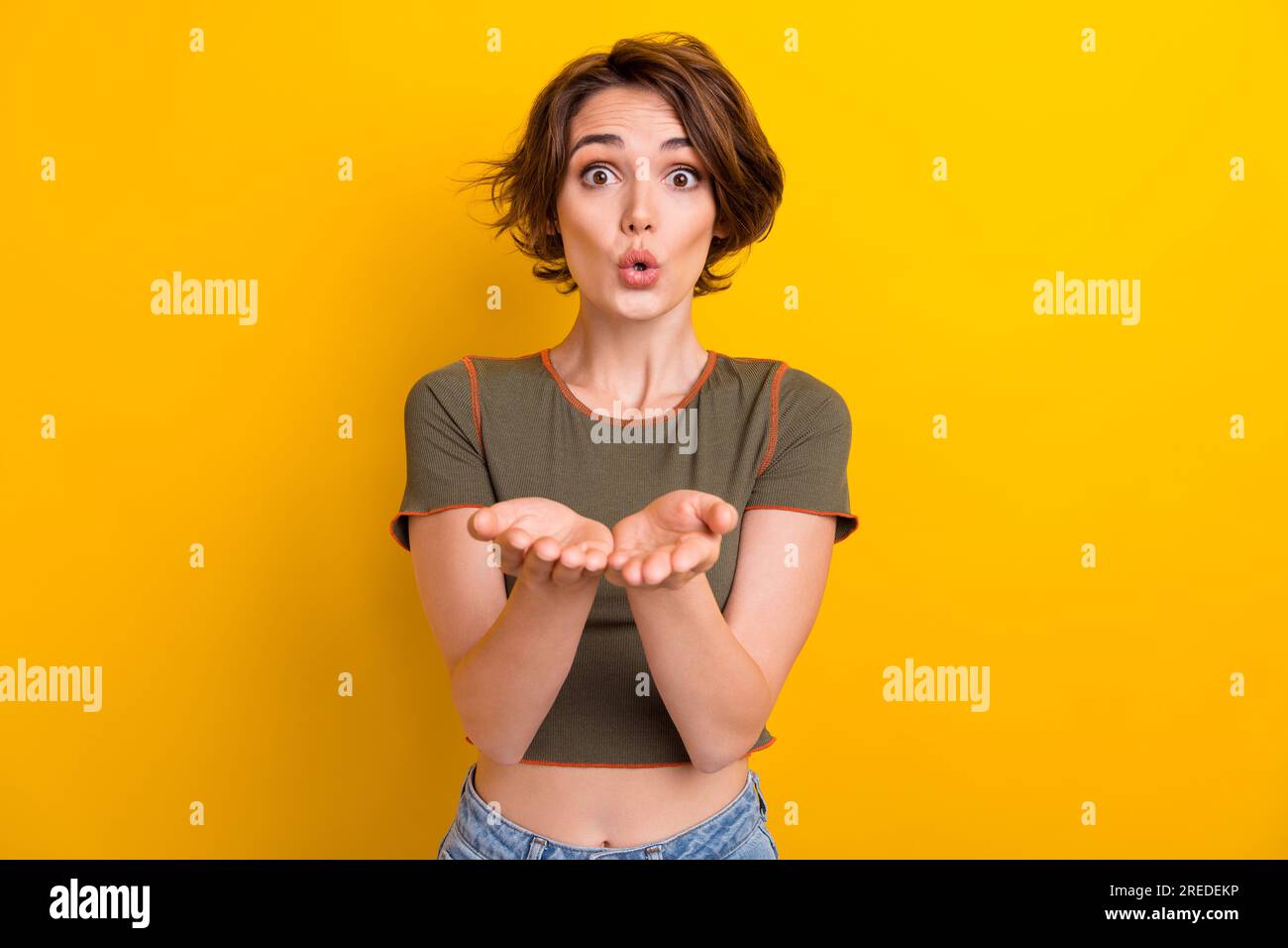 Photo of excited flirty girl dressed khaki top sending arms holding ...