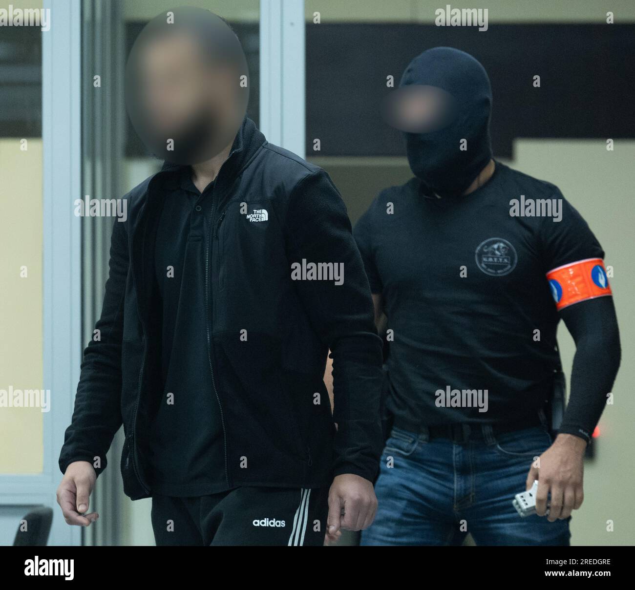 *** Attention all users - refiling with blurred accused***  Accused Salah Abdeslam pictured during a session to read the verdict of the trial of the terrorist attacks of March 22, 2016, at the Brussels-Capital Assizes Court, Tuesday 25 July 2023 at the Justitia site in Haren, Brussels. On March 22 2016, 32 people were killed and 324 got injured in suicide bombings at Zaventem national airport and Maalbeek/ Maelbeek metro station, which were claimed by ISIL.   BELGA PHOTO STAFF Stock Photo