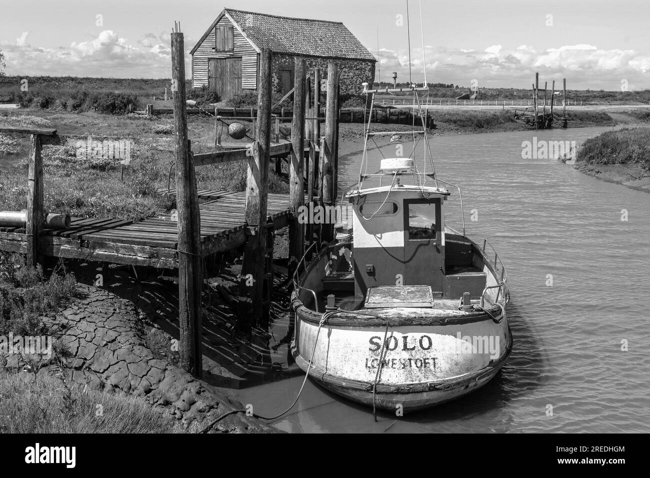 T'he coal shed'disused for storage when coal was brought up the rivers at high tide from the coast on barges for the local thornham inhabitants . Stock Photo
