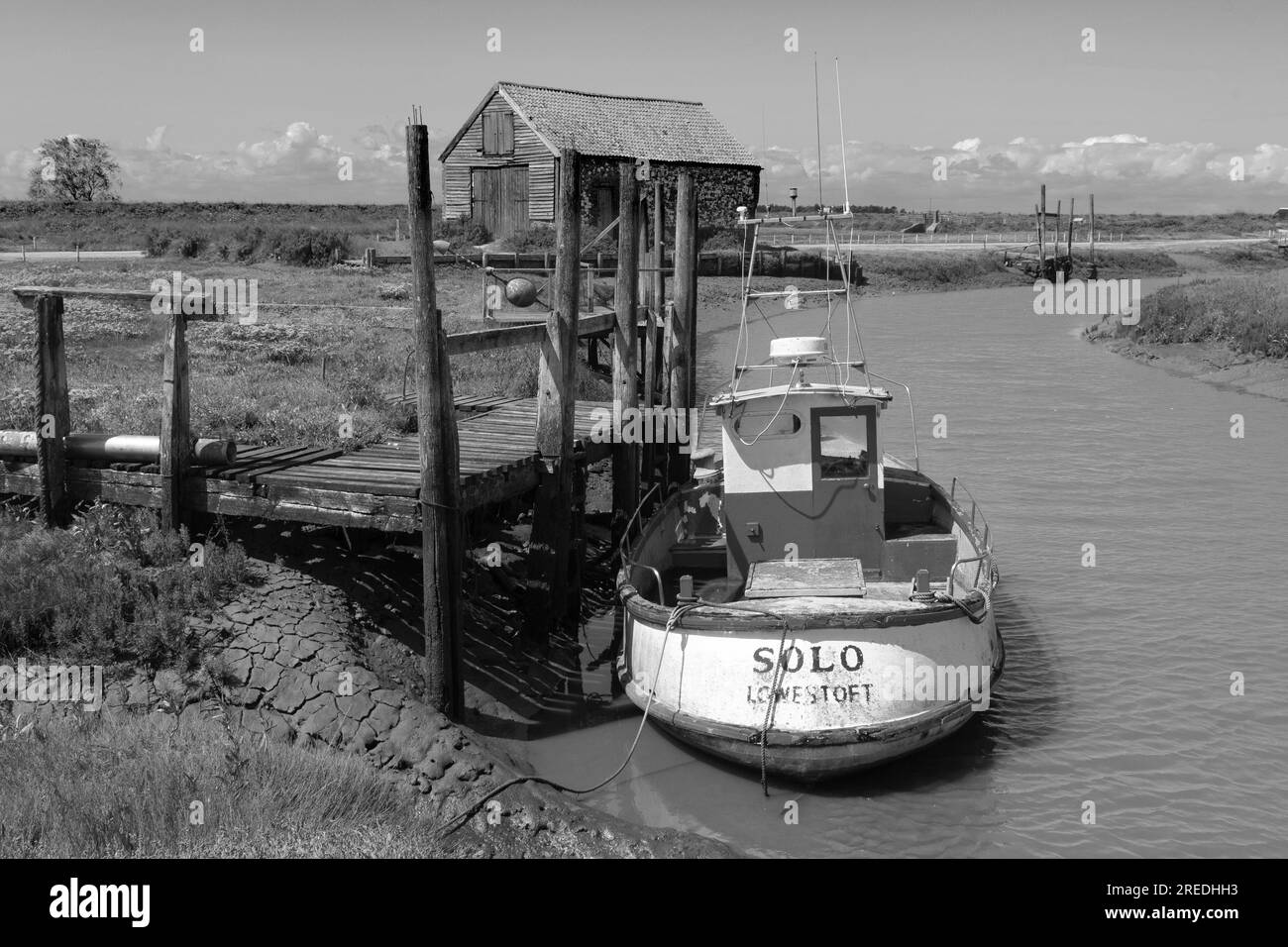 T'he coal shed'disused for storage when coal was brought up the rivers at high tide from the coast on barges for the local thornham inhabitants . Stock Photo