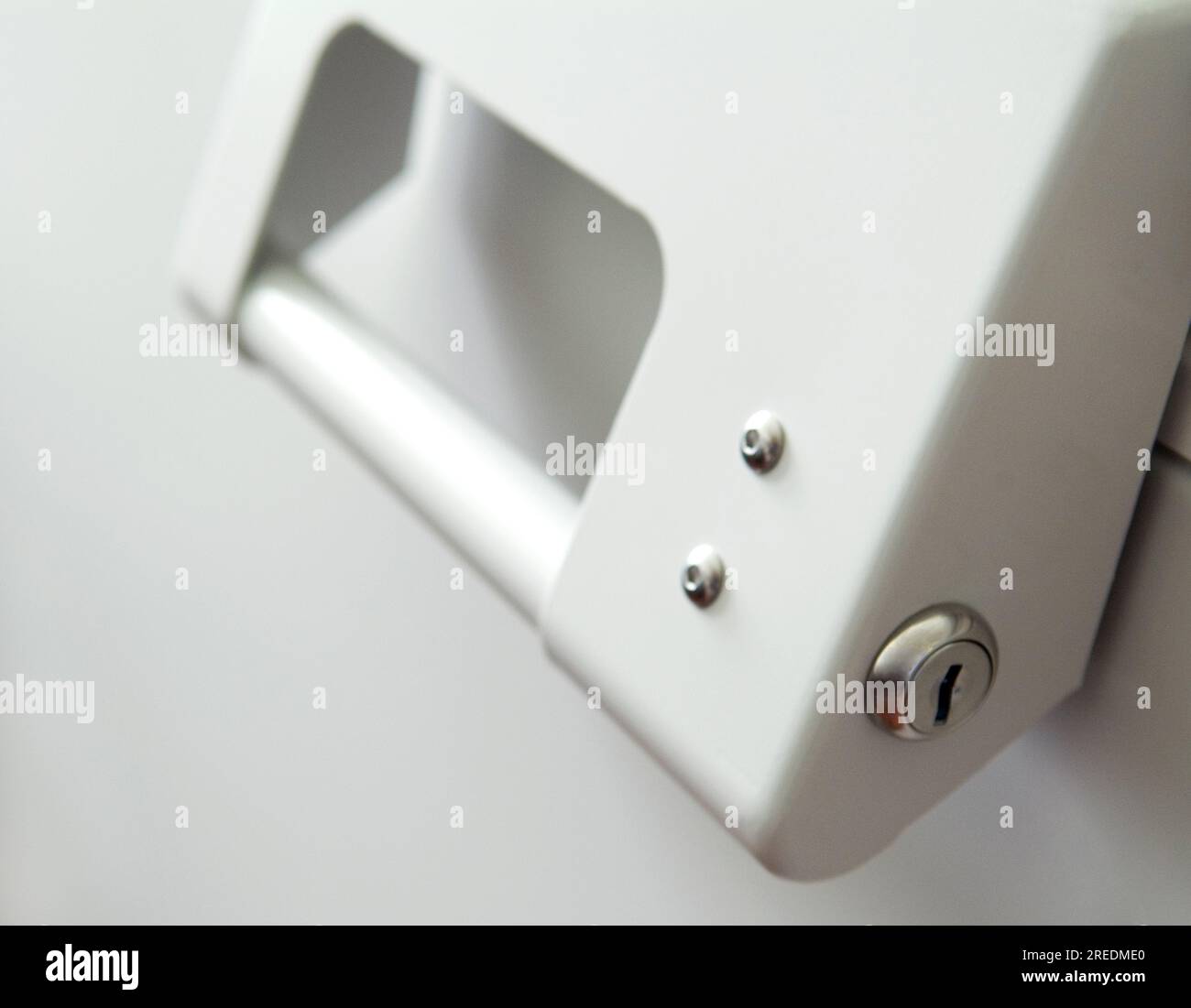 The handle of a freezer in a clean laboratory with science lab