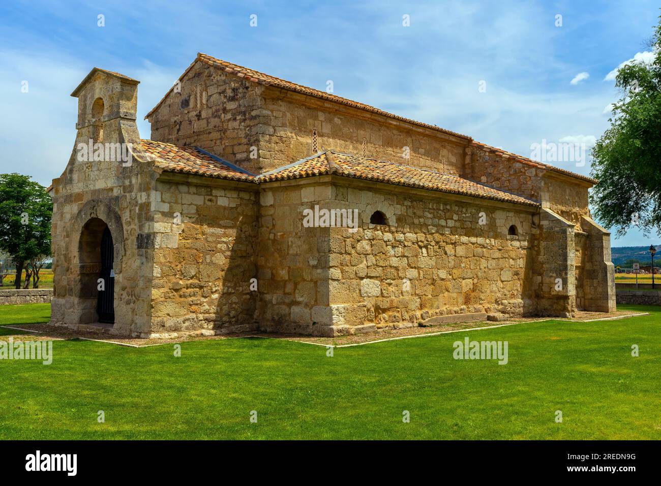 Exterior of Visigothic church of San Juan Bautista, founded in 661 AD. Located in small town Venta de Baños in the Cerrato district. Province of Palen Stock Photo