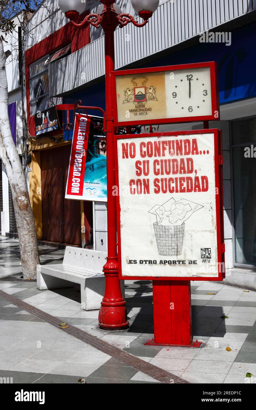 Sign in Spanish encouraging people not to throw litter in the streets on pedestrian Av 21 de Mayo street, Arica, Chile Stock Photo
