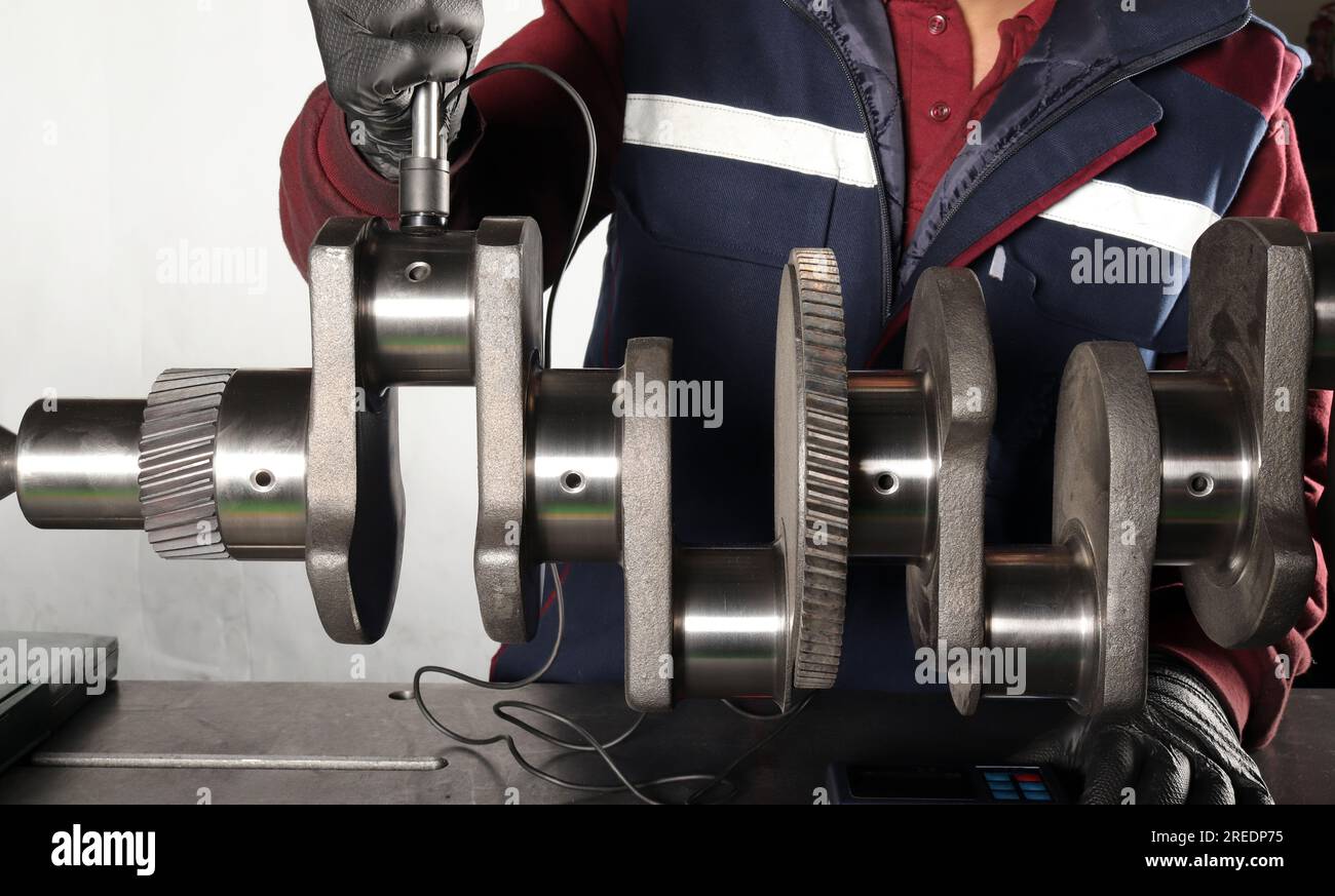 Master makes metal hardness measurement. Crankshaft Stock Photo Alamy