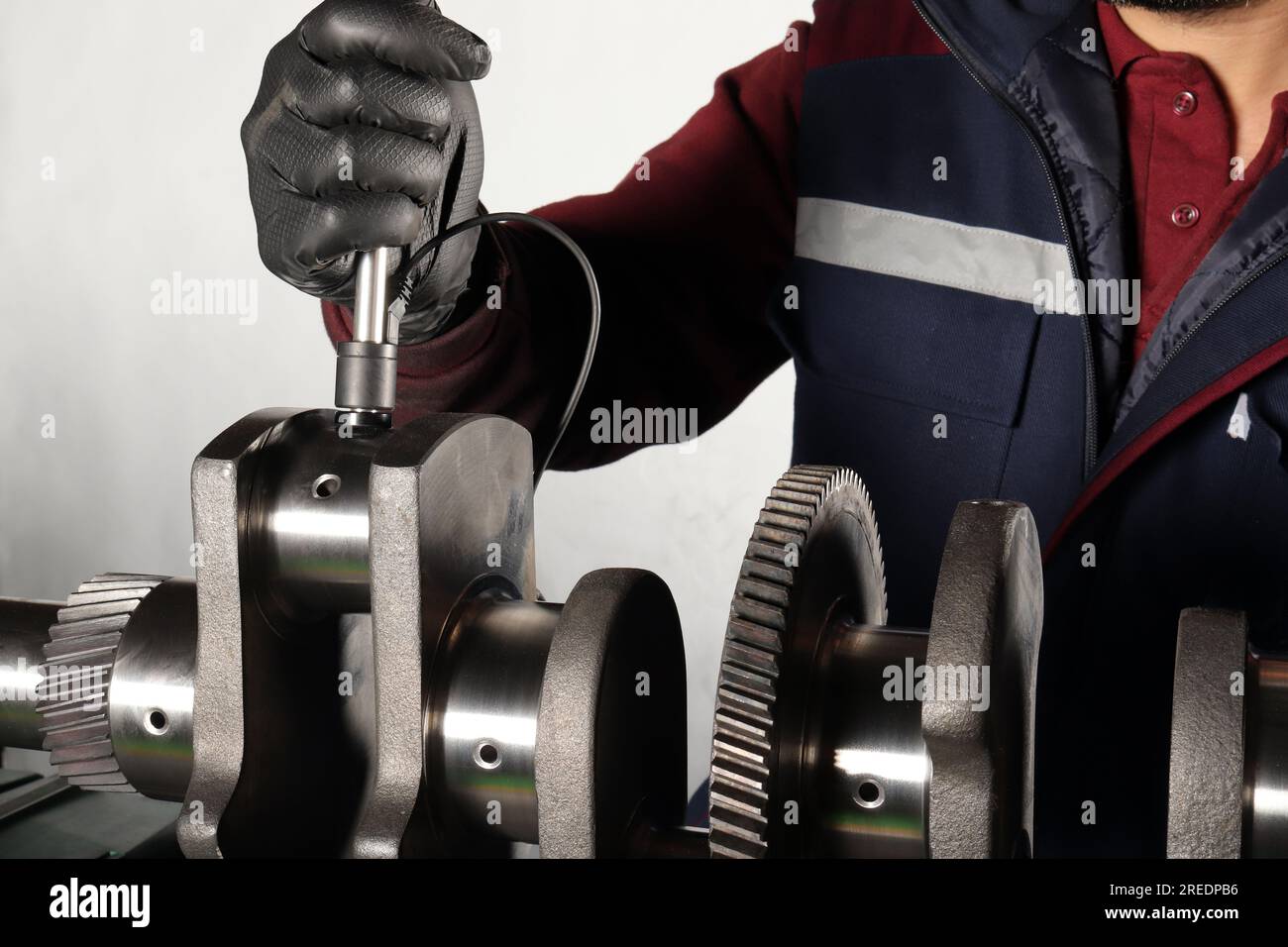 Master makes metal hardness measurement. Crankshaft Stock Photo Alamy