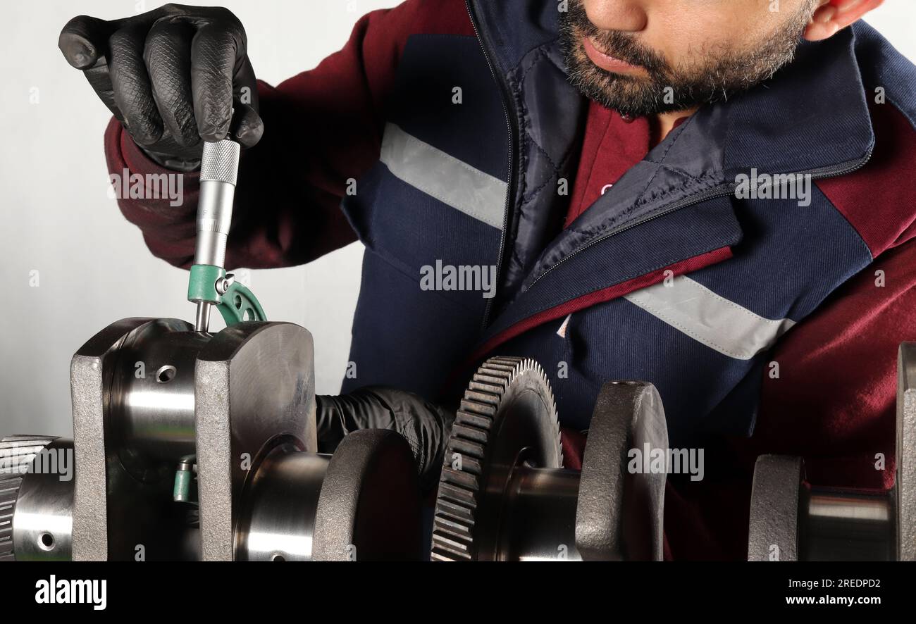 Master makes metal hardness measurement. Crankshaft Stock Photo Alamy