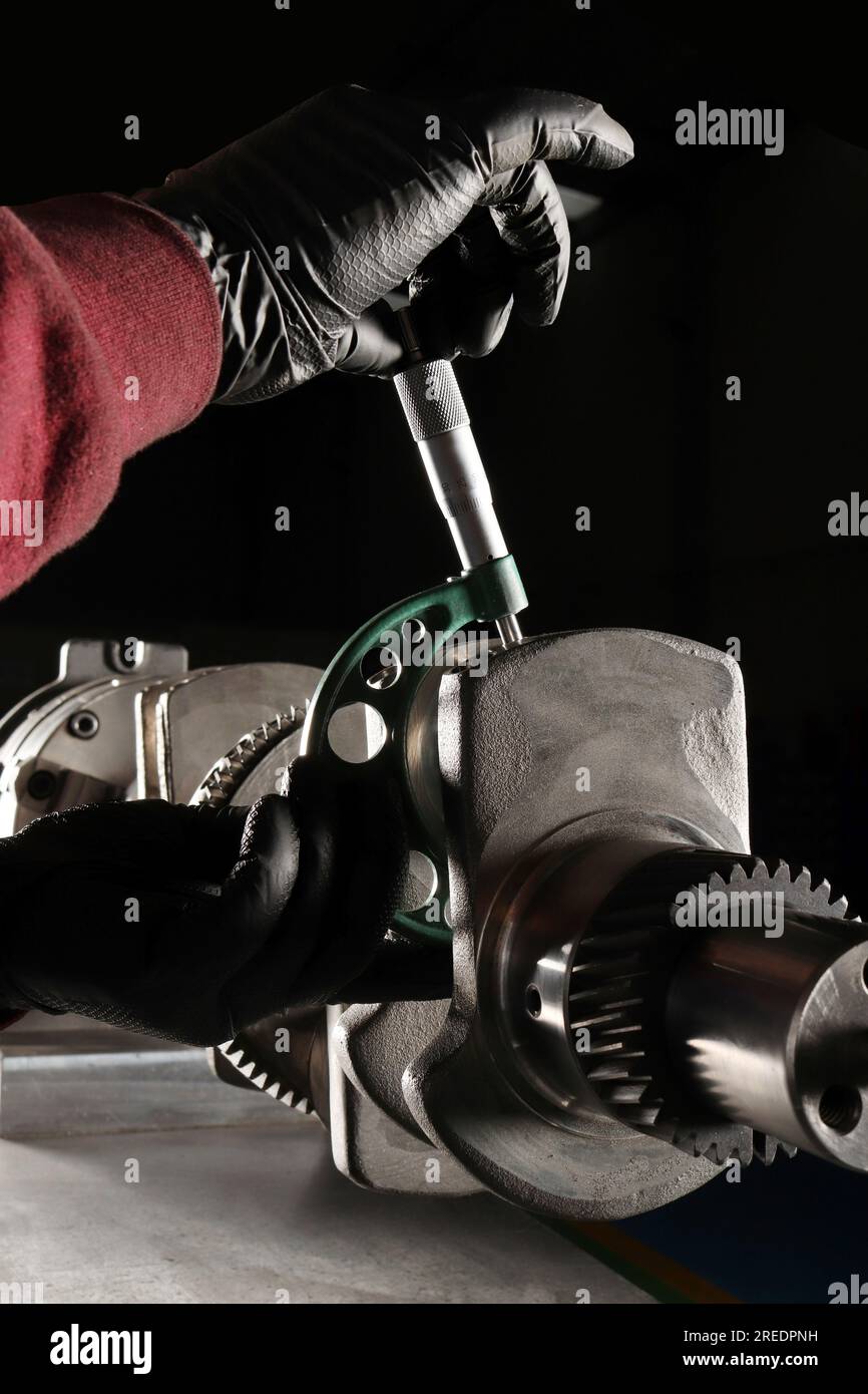 Master makes metal hardness measurement. Crankshaft Stock Photo Alamy