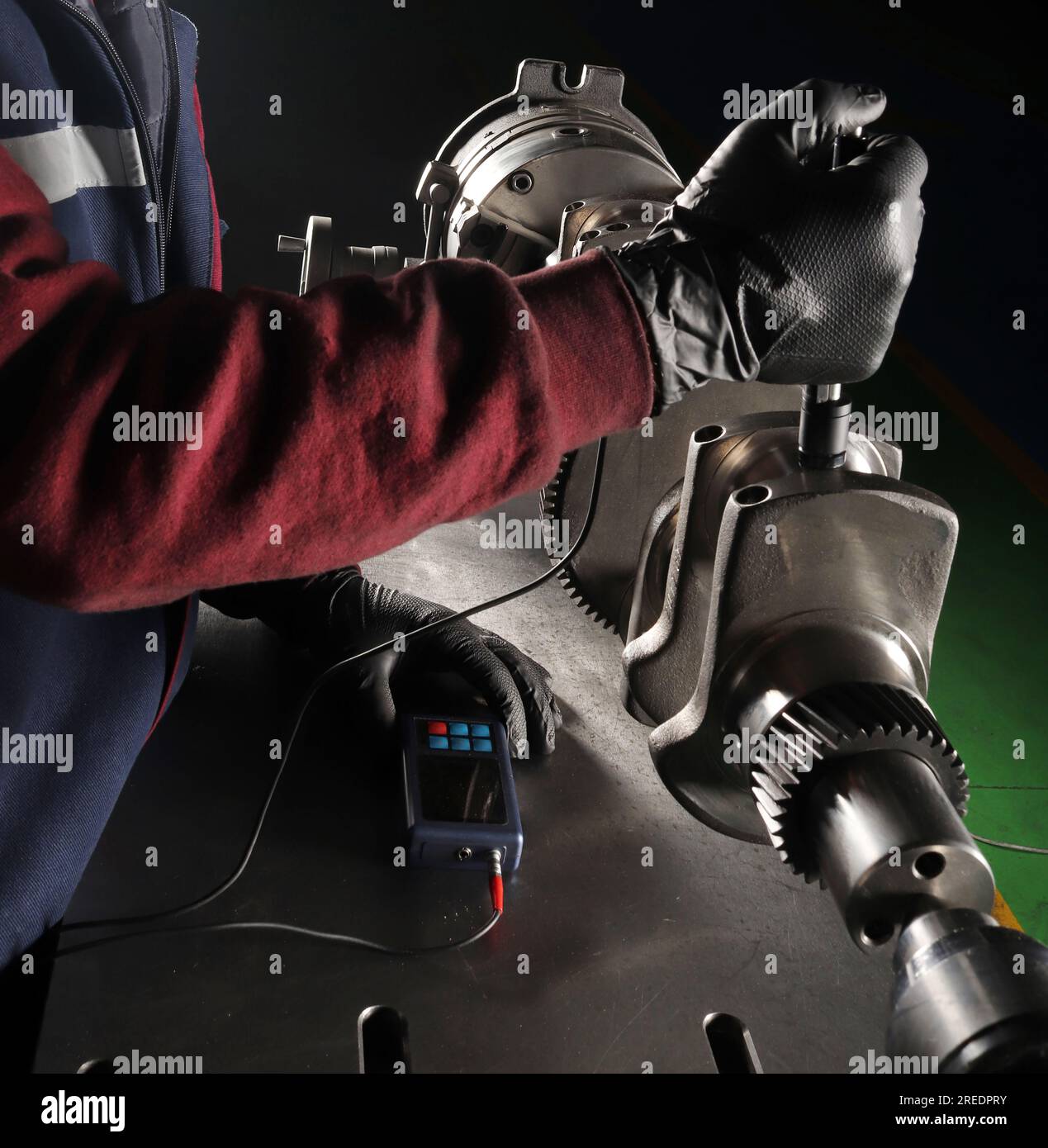 Master makes metal hardness measurement. Crankshaft Stock Photo Alamy