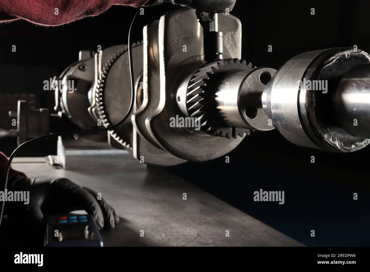Master makes metal hardness measurement. Crankshaft Stock Photo Alamy