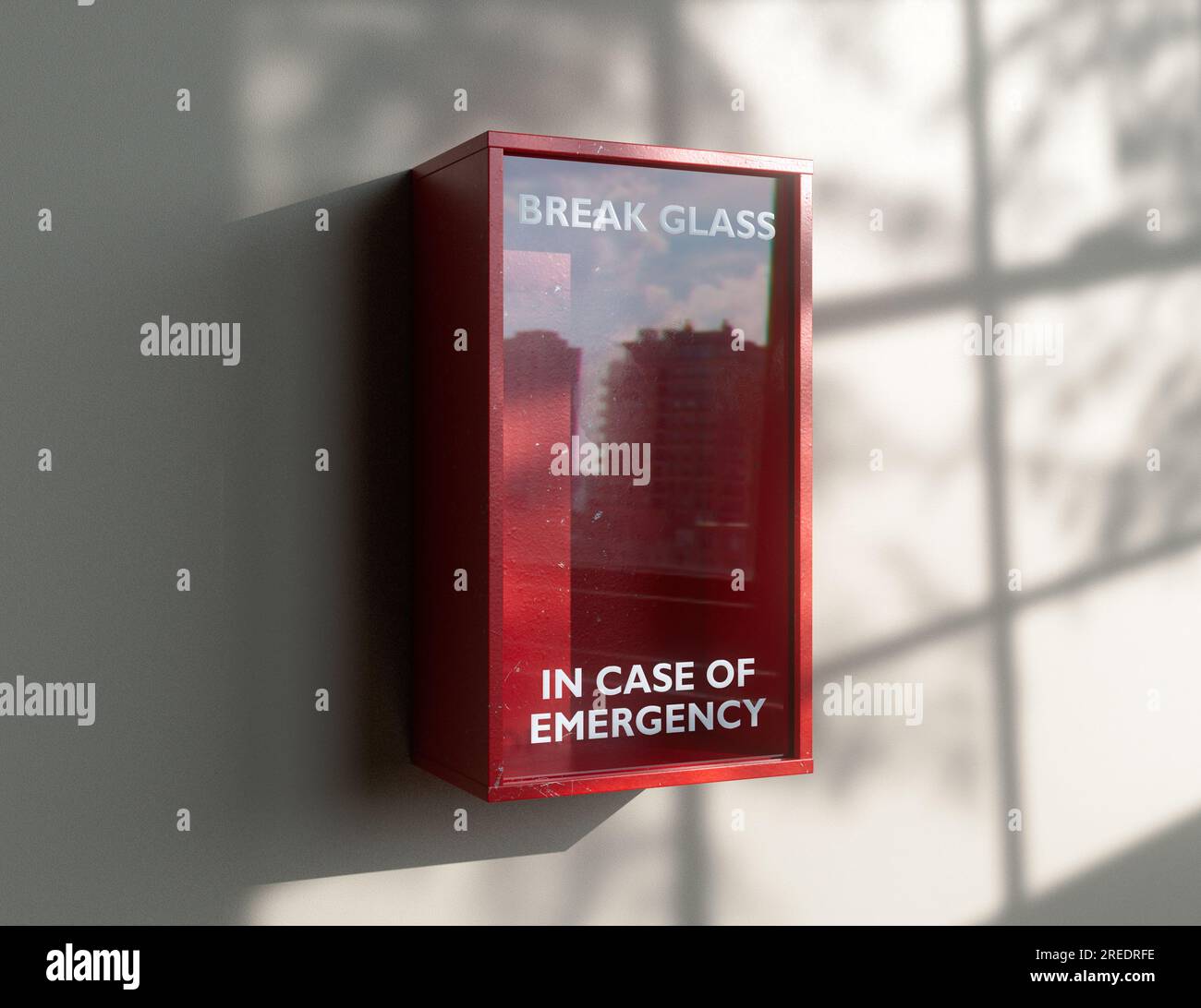 An empty red emergency box with an in case of emergency breakable glass on the front mounted on a wall - 3D render Stock Photo
