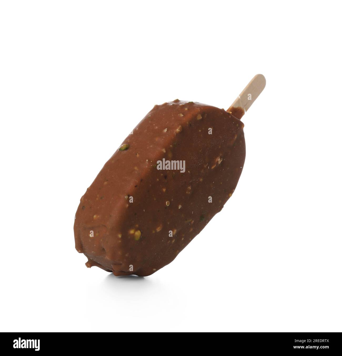 Delicious chocolate covered ice cream on stick against white background
