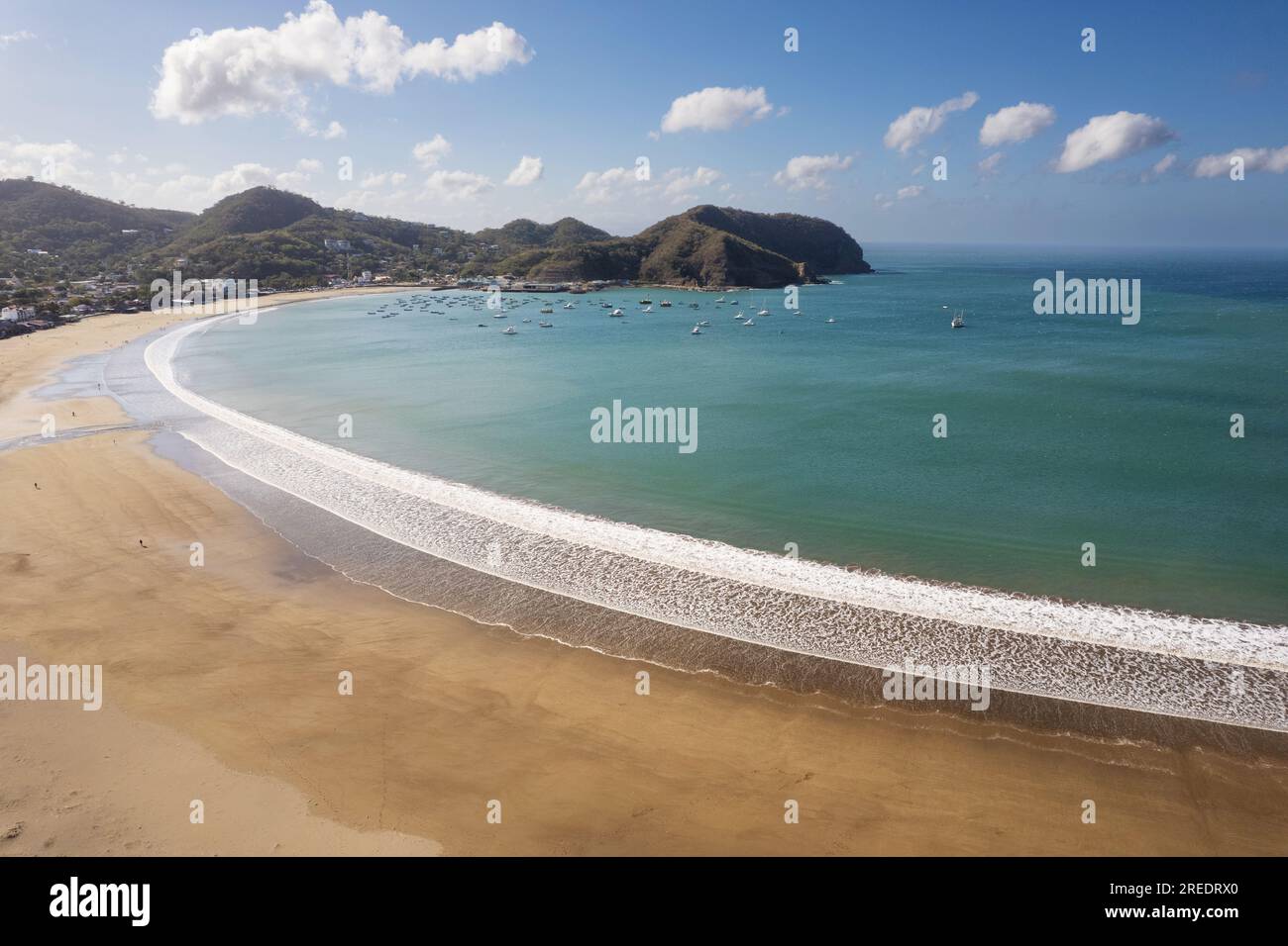 Beautiful beach on tropical bay sea aerial drone view Stock Photo