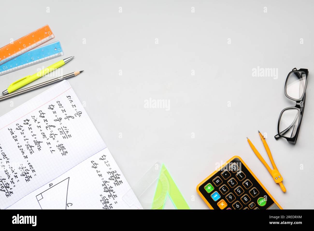 Calculate Page Math Copybook with maths formulas, calculator, glasses and stationery on ...